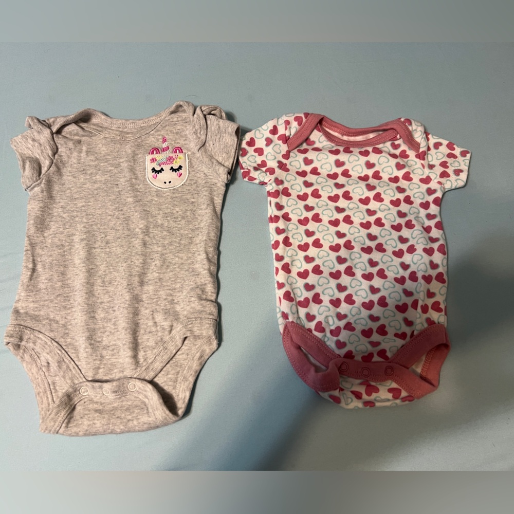 5 items for $20/Hearts and unicorns. Set of two onesies.